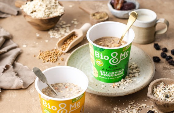 Immunity-Boosting Drinks and Snacks blog image 3- Bio and Me Gut Health Porridge brand surrounded by oats on a rustic table