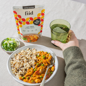 Fiid pouch behind a bowl of grains