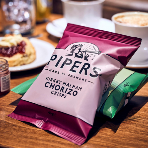 Pipers Chorizo Crisps on a Cafe Table