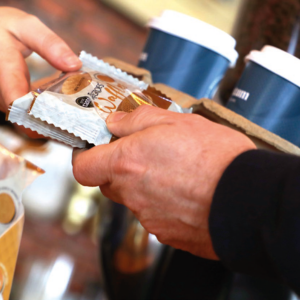 Tregroes Waffle being handed to a customer